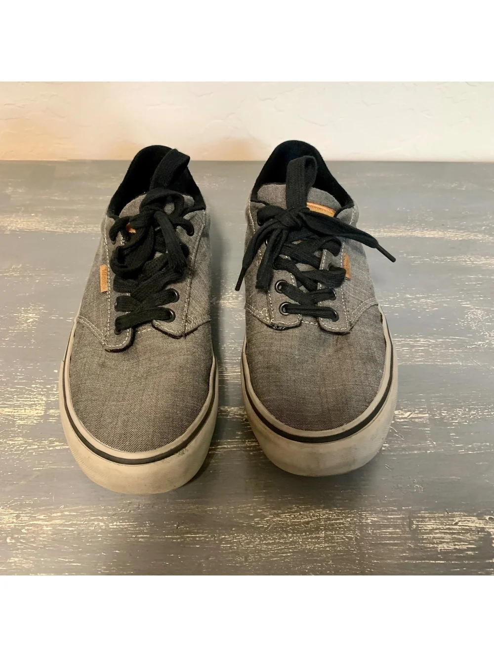 Gray low top lace-up sneakers